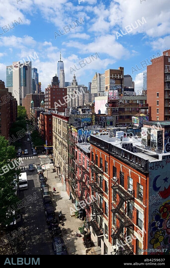 View from Manhattan Bridge to Madison Street, Chinatown and Graffitis on the Roofs, New York City, USA, North America.