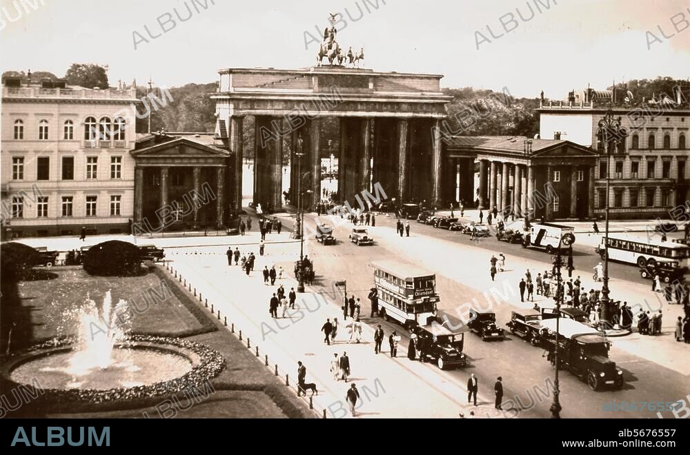 Germany, Berlin-Mitte, Brandenbur Gate, (1788-91 built by C.G.Langhans). Streetscene on the Pariser Platz. In the background the park Tiergarten. Photo, c. 1935.