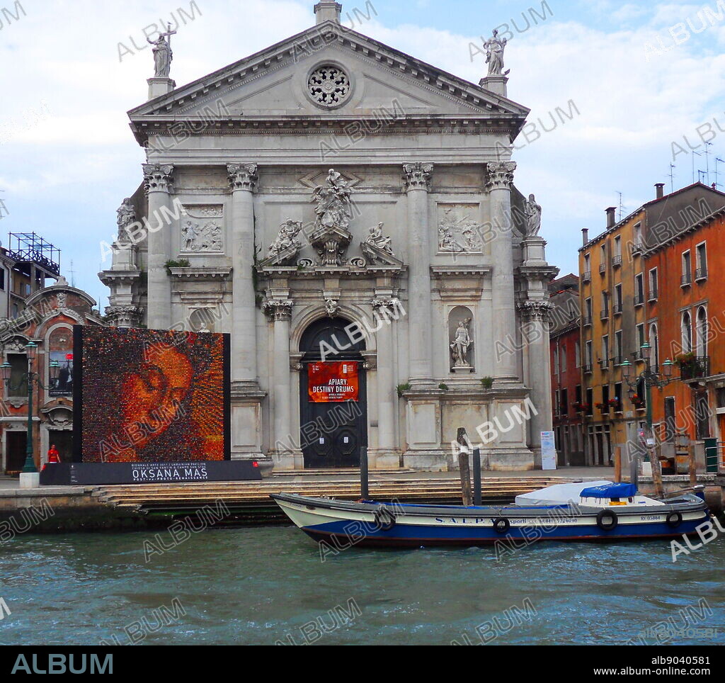 The San Stae church in Venice, Italy. Located in the Santa Croce quarter in the centre of the city. Photographed from the Grand Canal, showing the sculptural features on the architecture.