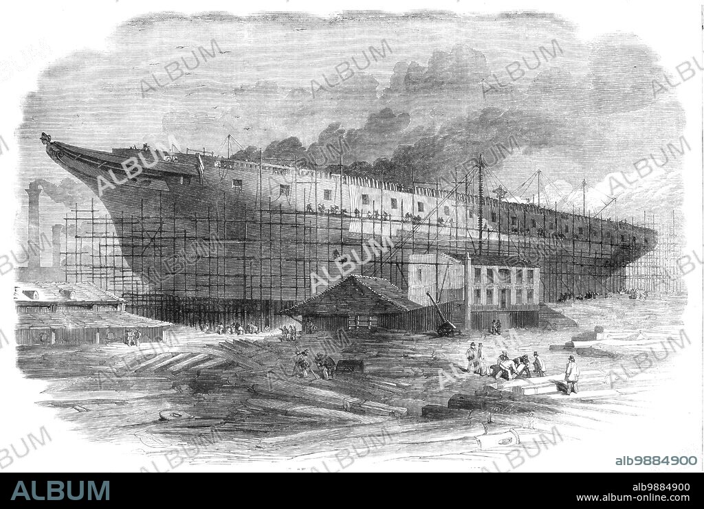 SMYTH. Building the great steam-frigate "Warrior" at the Thames Ironworks, Blackwall, 1860. Admiral Sir Baldwin Wake Walker, Surveyor of the Navy, was responsible for the Royal Navy's warship construction programme during the 1850s naval arms race and at the time of the introduction of the Ironclad warship. It was his decision to build HMS Warrior. She was the second largest ship in the world, after the Great Eastern, and was constructed, 'under the immediate superintendence of Captain Ford, the managing director'. The Warrior was armour plated, and built to carry 36 guns. From "Illustrated London News", 1860.