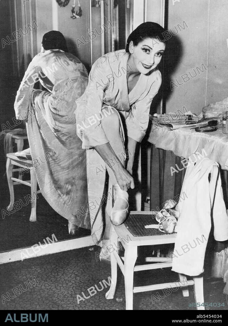 Prima Ballerina Margot Fonteyn in her dressing room at the Metropolitan Opera House in New York during the Sadler's Wells Ballet Company tour of the United States. October 11, 1949.