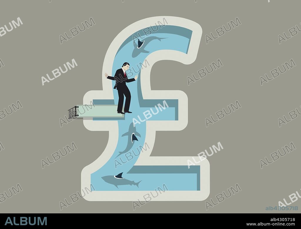 Businessman balancing on diving board above shark infested British pound shaped swimming pool.