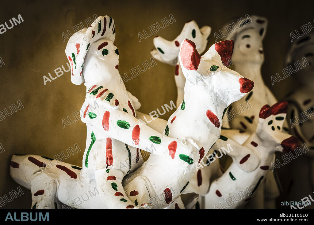 Siurells, traditional figurine, painted white with red and green speckles, Museu del Fang (Mud Museum) Sa Cabaneta, Marratxí, Mallorca, Balearic Islands, Spain.