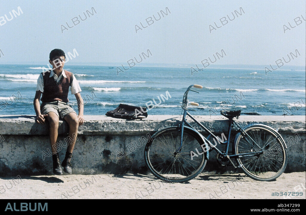 GIUSEPPE SULFARO en MALENA, 2000, dirigida por GIUSEPPE TORNATORE. Copyright MEDUSA FILM/MIRAMAX FILMS / CEVALLOS, FABIAN.