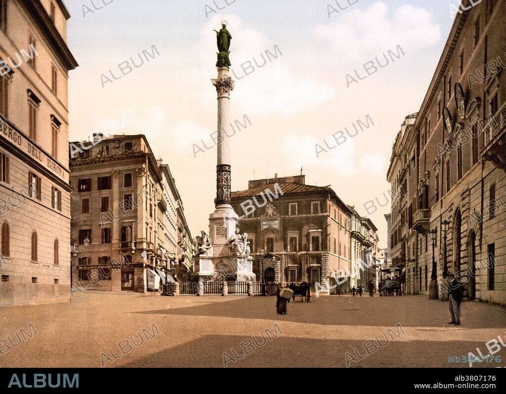 The Column of the Immaculate Conception or la Colonna dell'Immacolata, is a 19 century monument in central Rome, located in the Piazza Mignanelli, the south west extension of Piazza di Spagna. The monument was designed by the architect Luigi Poletti and commissioned by Ferdinand II, King of the Two Sicilies. The column was dedicated on December 8, 1857. The structure is a square marble base with statues of biblical figures at the corners that uphold a column of Cipollino marble. Atop the column is a bronze statue of the Virgin Mary, sculpted by Giuseppe Obici. The standard imagery of the immaculate conception is used: a virgin on a crescent, atop the world, stomping a serpent. The Corinthian column itself was sculpted in ancient Rome, and was discovered in 1777 during the construction of the monastery of Santa Maria della Concezione. At the base are four statues of Hebrew figures that gave portent of the virgin birth, each accompanied by a quote of a biblical verse in Latin, including David (by Adam Tadolini), Isaiah (by Salvatore Revelli), Ezekiel (by Carlo Chelli), and Moses (by Ignazio Jacometti). Detroit Publishing Company circa 1890-1900.
