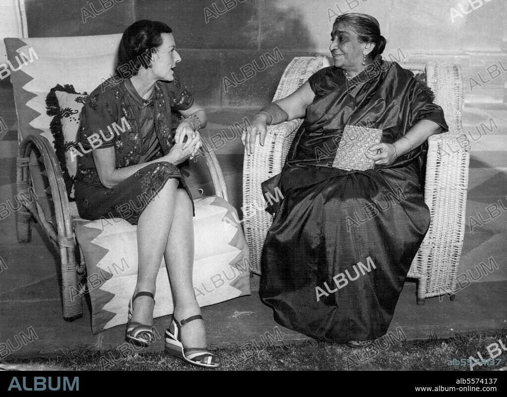 Lady Mountbatten Meets Mrs. Sarojini Naidu - Lady Mountbatten (Left) wife of the new Viceroy of India chats with Mrs. Sarojini Naidu in the Garden of the ***** lodge, New Delhi. April 17, Mrs. Naidu, a top ranking member of the congress party his command is well known for her poetry and oratory. It is believed they discussed social welfare problems.
Lady Louis Mountbatten, wife of the Viceroy of India, chats with Mrs. Sarojini Naidu, who is a top ranking member of the Congress Party, and is well known for her poetry and oratory. April 23, 1947. (Photo by Associated Press Photo).
