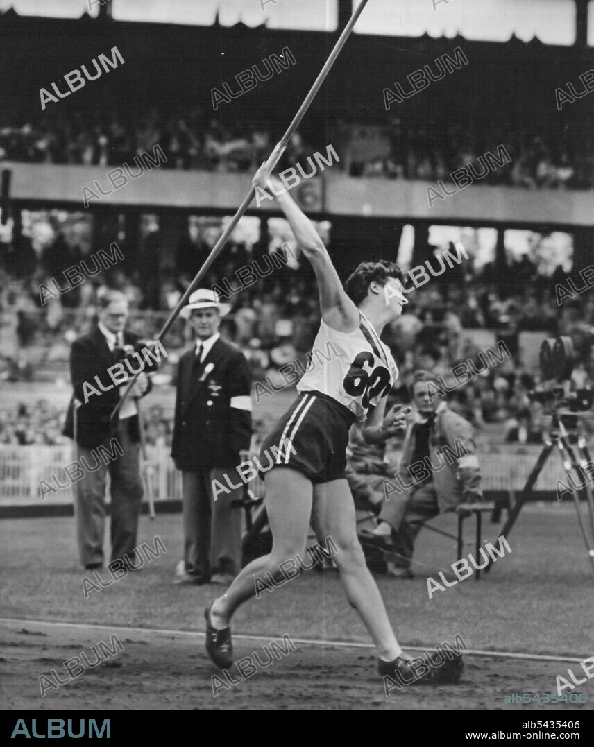 Maureen Wright, of Australia, (603), competing in the qualifying trials of the women's javelin at the Main Stadium this morning. November 6, 1928. (Photo by Aust. Segment Olympic Photo Assoc.).