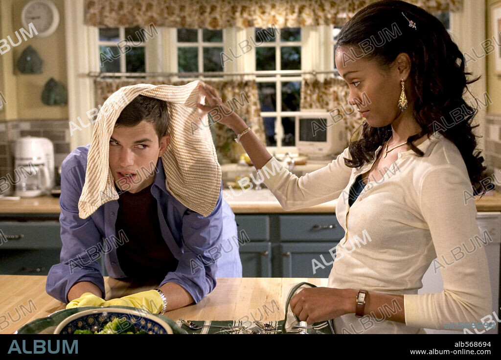 ASHTON KUTCHER and ZOE SALDANA in GUESS WHO?, 2005, directed by KEVIN RODNEY SULLIVAN. Copyright COLUMBIA PICTURES / BARIUS, CLAUDETTE.