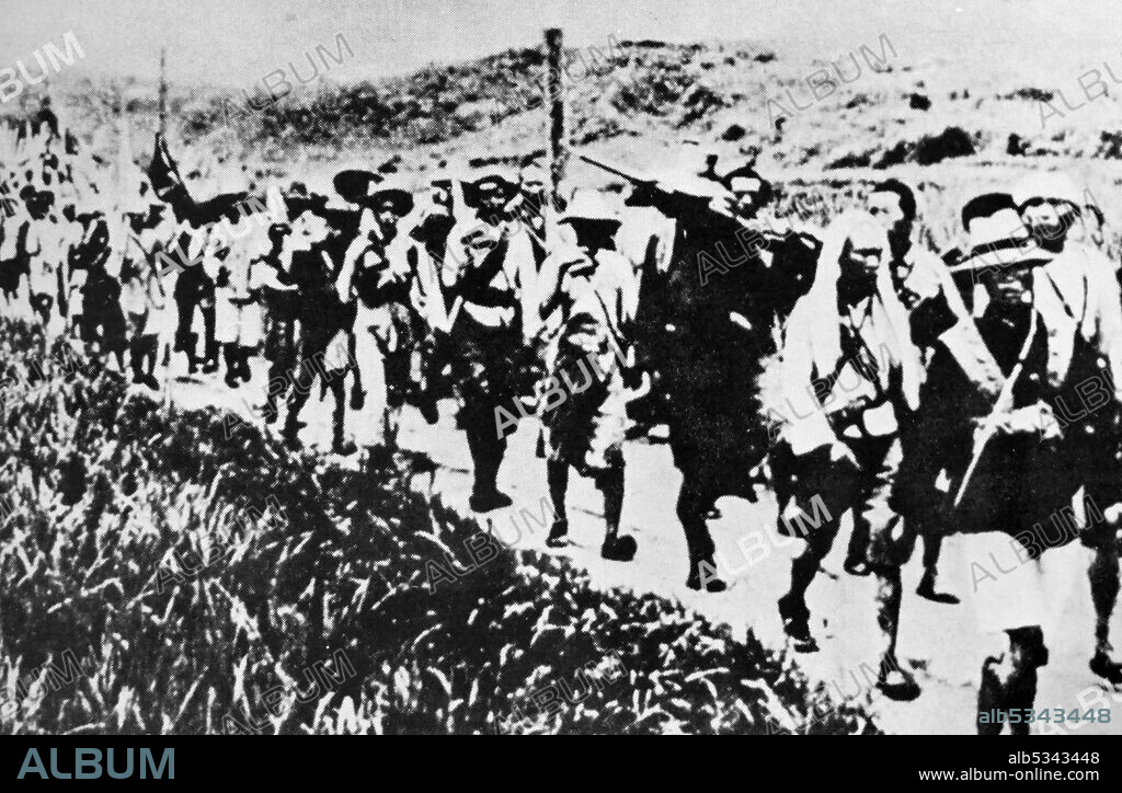 Red army soldiers on the Long March, 1935.  The Long March was a military retreat undertaken by the Red Army of the Communist Party of China, the forerunner of the People's Liberation Army, to evade the pursuit of the Kuomintang arm.