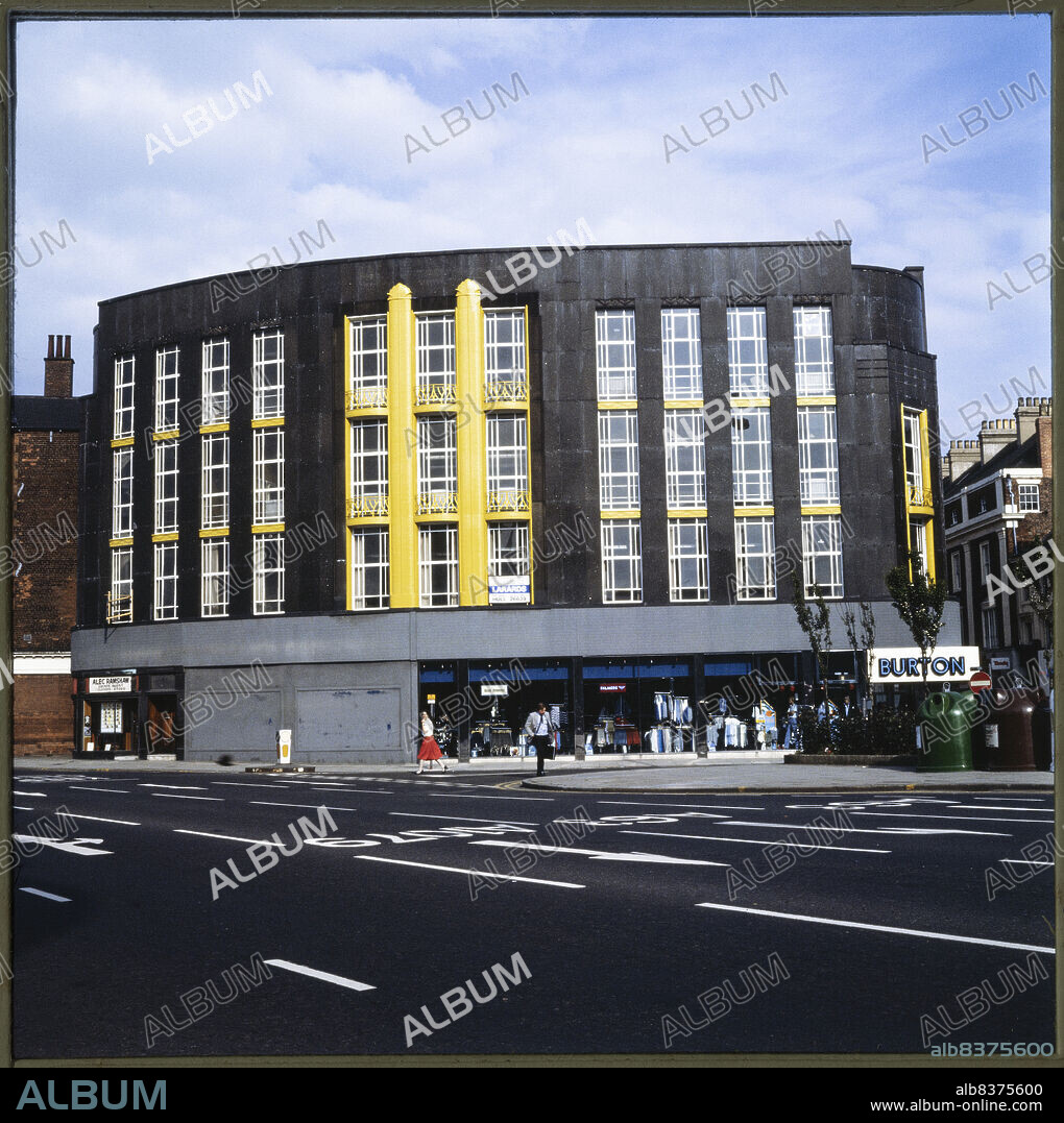NICHOLAS ANTHONY JOHN PHILPOT. Burton, Alfred Gelder Street, Kingston upon Hull, 1970-1990. The Burton store at 68 Alfred Gelder Street and 34-35 Whitefriargate, seen from the west showing the impressive black granite facade and gold metalwork details. Burton opened a store on the site in 1931; the store shown in this photograph opened in 1935. The building is considered to be an important and unusual example of Burton in-house architectural design. Granite facades featured on around 15 Burton stores, with the granite for the Hull store being supplied by Fenning & Co of Hammersmith.