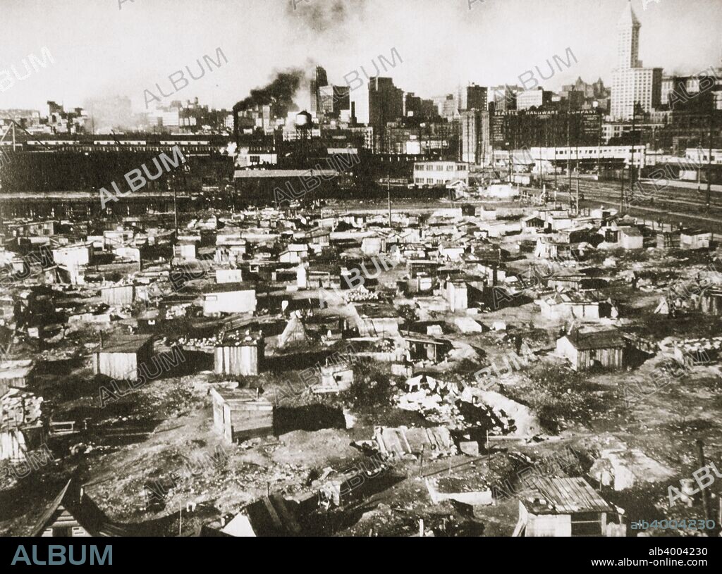 A 'Hooverville' on waterfront of Seattle, Washington, USA, Great Depression, March 1933. Grim collections of shacks on vacant lots were cruelly called 'Hoovervilles' after Herbert Hoover, US President at the time.