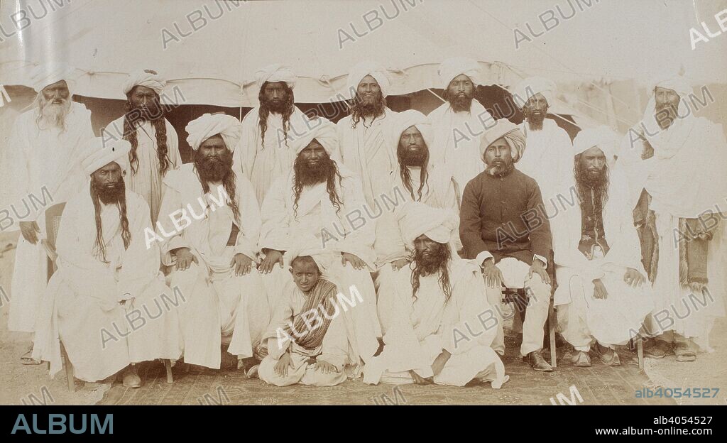 BOURNE & SHEPHERD. The tribes of Marris and Bagtis (Baluchistan). Group portrait, with Nawab Mir Khanbaksh Khan (Chief of the Marri Tribe) and Nawab Sir Shabaz Khan (Sirdar of the Bagti Tribe), seated in centre. Probably photographed at Delhi during the Delhi Durbar. India, 1902-03. Source: Photo 430/78/(129).