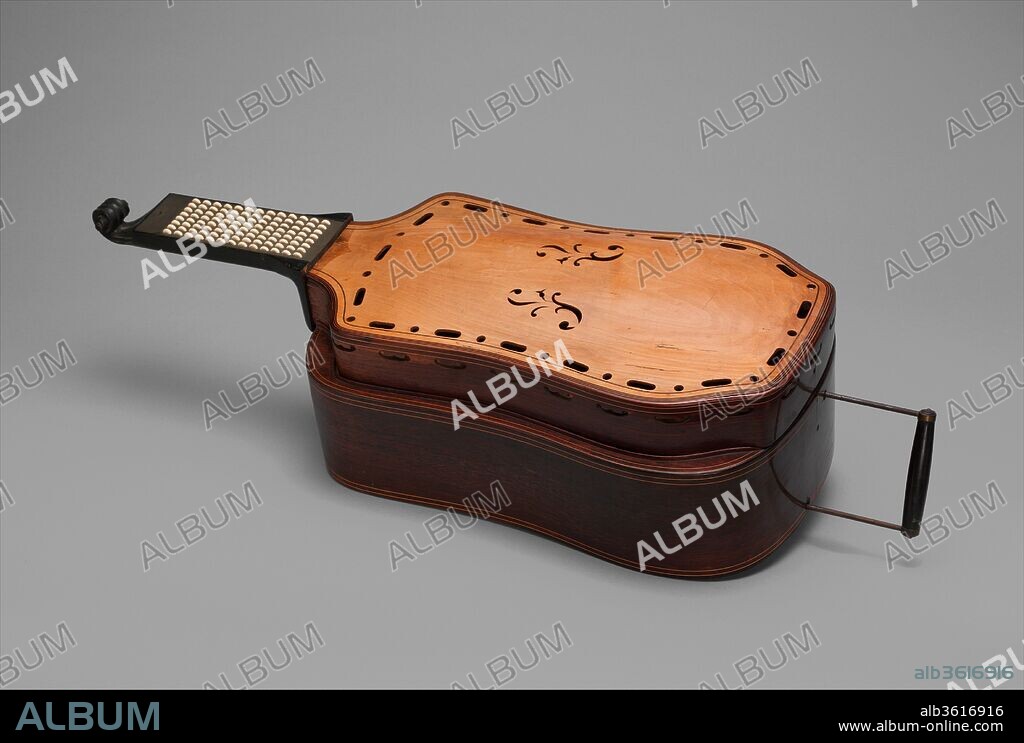 Melophone. Culture: French. Dimensions: L. 79 cm (31 1/8 in.) x  W.  30.5 cm (12 in.) x D.  19.5 cm (7 11/16 in.)
Case length without neck: 50 cm (19 11/16 in.). Date: ca. 1850-55.
The melophone, which was invented in Paris in 1837, was developed for classical music. The inventor, the music-box maker Pierre Charles Leclerc, persuaded the composer Fromentin Halévy to include a melophone solo in his opera Guido et Ginevra in 1838-and this opened the doors to the salons of many Paris opera patrons. But the success of the melophone was modest; its use declined, and it fell out of style in the 1850s and 60s. Beside its occasional use in the salons in France, it was also known in Italy and southern Germany. 
The melophone is a free-reed instrument related to accordions, concertinas, reed organs, and harmonicas.  The setup, with a double bellows and a push-and-draw lever, allows the player to perform tremolo and staccato, soft and loud. The thumb lever is an octave coupler. The fingering mechanism imitates the technique of violin and guitar, making it easy for string players to play the melophone. The eight vertical rows of the fingering mechanism correspond to strings tuned in fifth, and the thirteen individual buttons correspond to the half steps.