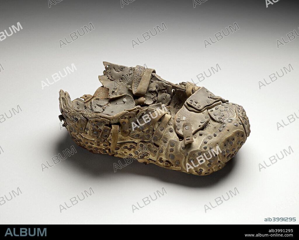 Shoe (Dynton Hermit's shoe), 17th century. Dynton hermit shoe belonging to John Bigg. Dimensions: height x width x depth: 35 x 23.5 x 11 cm.