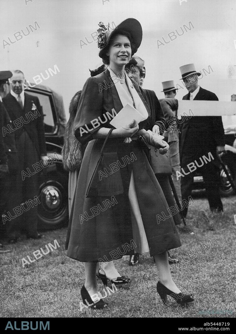 Princess Sees Richest Derby - Princess Elizabeth walks a paddock on Epsom racetrack England, May 2, After seeing French Owner Marcel Boussac Bring off the *****-derby Double. Boussac's Colt Galcador, ridden by Rae Johnstone, won the £17,000 derby by a hear from William Woodward's Prince *****, the Redhot Favourite. Jockey Rode Bolssac's filly Asmena to win the Oaks May 25. Princess At Epsom. Princess Elizabeth walks from the paddock Epsom after seeing French owner Marcel Boussac complete the Oaks-Derby double. Australian "Togo" Johnstone rode both winners-Galcador in Derby, and Asmena in the Oaks. May 27, 1950.(Photo by Associated Press Photo).