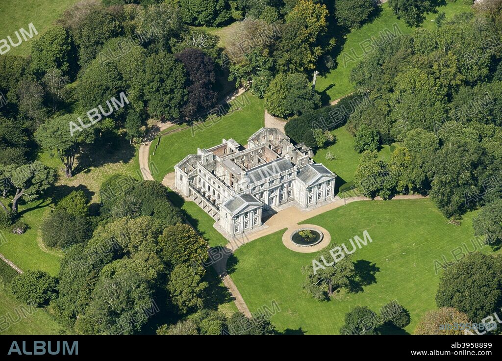 Appuldurcombe House, Isle of Wight, c2010s(?). Begun in 1702, the Baroque house was designed by John James and built on the site of an earlier Tudor house for Sir Robert Worsley, 4th Baronet. In the 1770s the house was extended by Sir Richard Worsley, 7th Baronet and Capability Brown was commissioned to lay out the gardens.