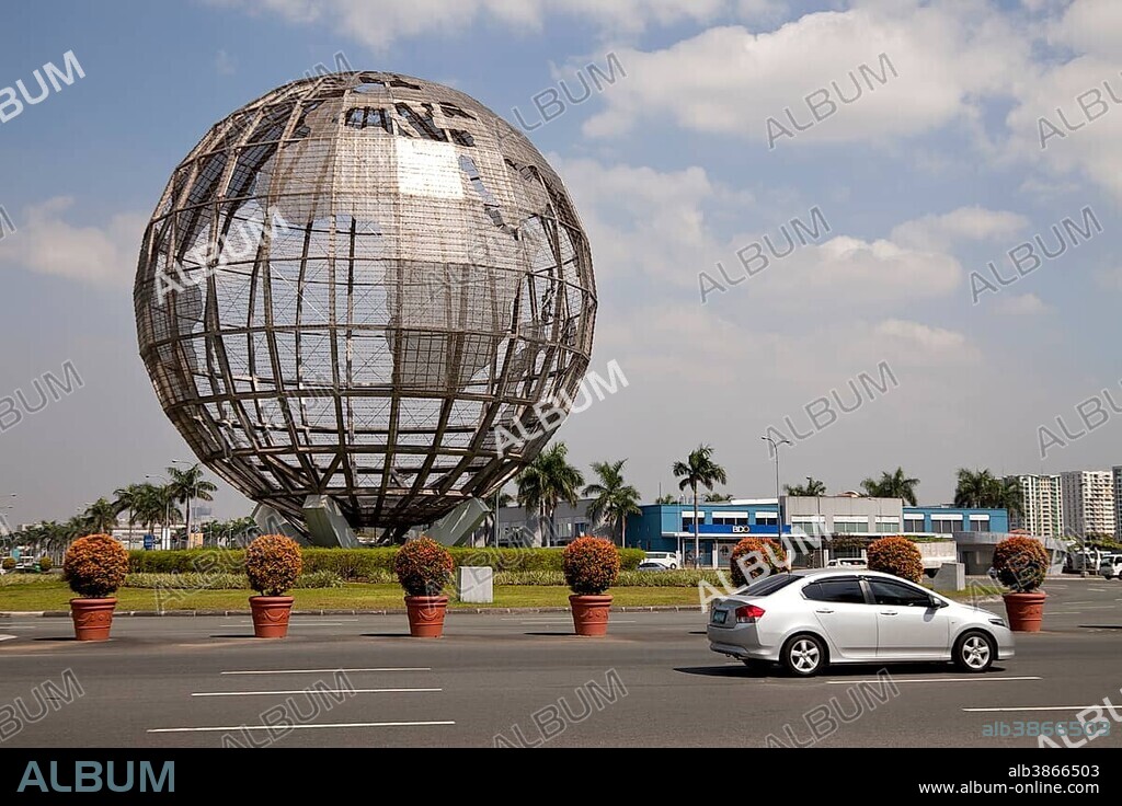 Giant globe at a roundabout outside the Mall of Asia shopping centre, Manila, Philippines, Asia