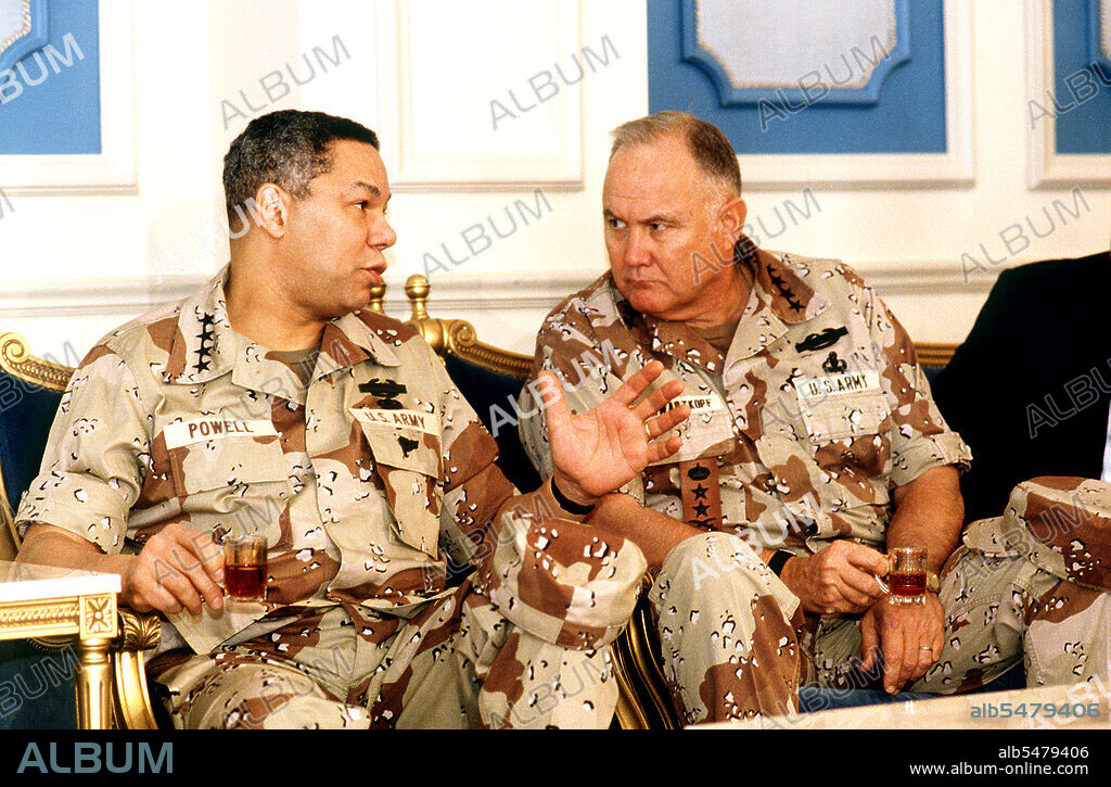 DESERT SHIELD - Colin Powell in fatigues in Saudi Arabia with General Schwarzkoph.