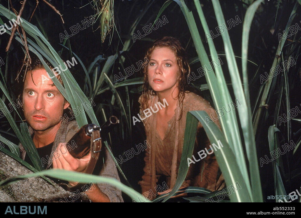 KATHLEEN TURNER und MICHAEL DOUGLAS in ROMANCING THE STONE, 1984, unter der Regie von ROBERT ZEMECKIS. Copyright 20TH CENTURY FOX.
