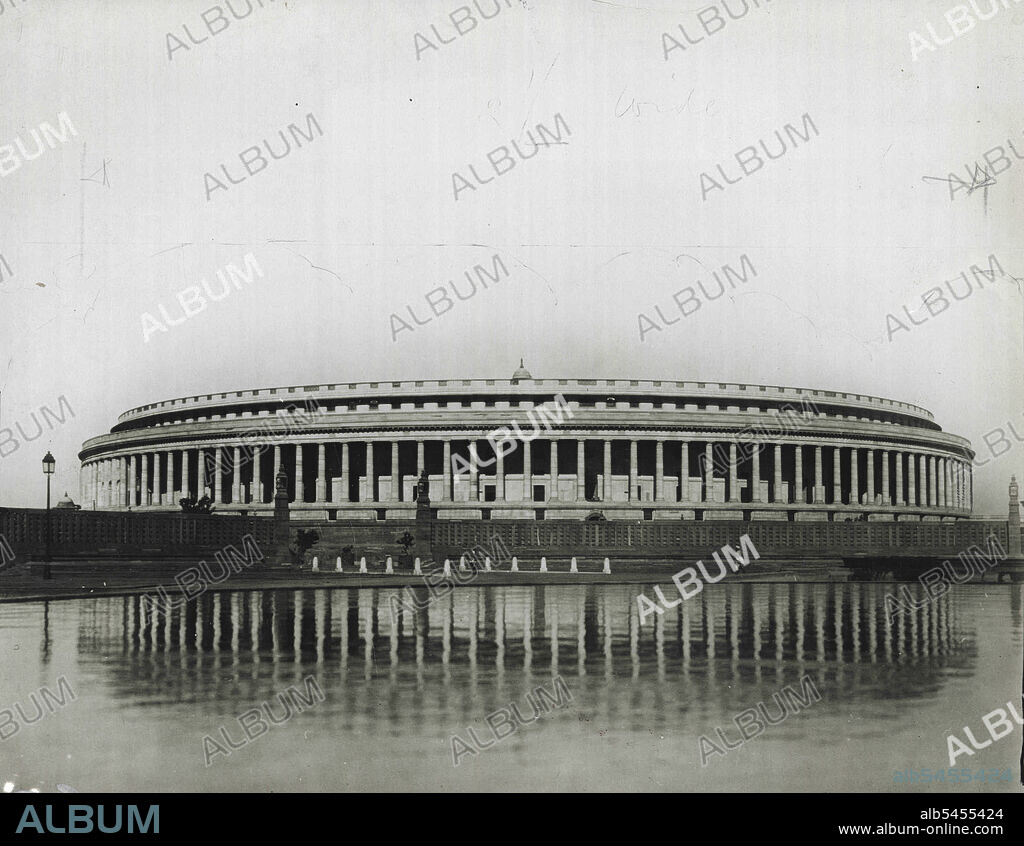 ***** Of New Delhi - The magnificent Council House, design by Sir Herbert Baker. This round ***** building, which covers an area of five acres, is the home of the Indian Legislature and the meeting place of the Indian Chamber of Princes. ***** designed by Sir Herbert Baker. This round ***** building, which covers and area of five acres, is the home of the Indian Legislature and the meeting place of the Indian Chamber of Princes. March 11, 1931.
