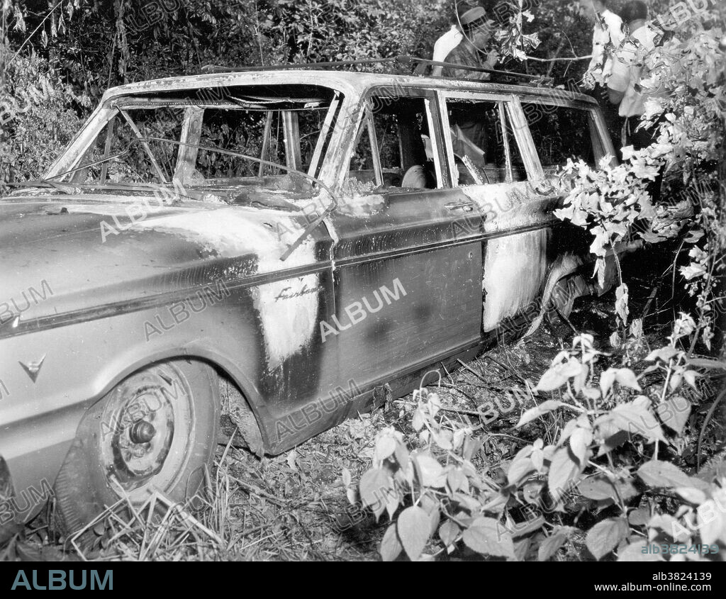 The Ford station wagon driven by civil rights activists Michael Schwerner, James Chaney, and Andrew Goodman that was discovered on June 23, 1964 following their disappearance. Its charred condition resulted in agents naming the case MIBURN, short for Mississippi Burning. They had been working with the "Freedom Summer" campaign to register African-Americans to vote. They were arrested for speeding, escorted to the local jail and held for a number of hours. They were released, but followed by law enforcement and others. Their car was pulled over, they were abducted, driven to another location, shot at close range and their bodies transported to an earthen dam and buried. Their bodies were discovered two months later thanks to a tip-off. During the investigation it emerged that members of the local White Knights of the KKK, the Neshoba County Sheriff's Office and the Mississippi Police Department were involved in the incident.