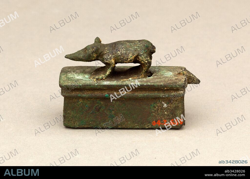 Shrew-mouse surmounting shrine-shaped box for an animal mummy, Late Period–Ptolemaic Period, 664–30 B.C., From Egypt, Cupreous metal, H. 3.5 cm (1 3/8 in.); W. 1.8 cm (11/16 in.); L. 5.5 cm (2 3/16 in.), The shrew mouse was an animal sacred to the solar deity Horus of Letopolis, but was honored all over Egypt, particularly in the Delta. The mouse was considered to be the blind eye of Horus, which was miraculously healed, thereby symbolizing resurrection and rebirth.