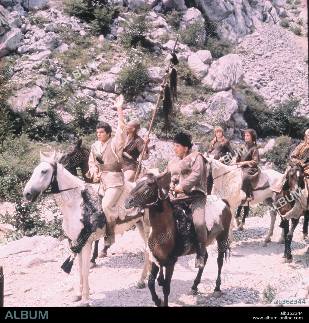 OMAR SHARIF and TELLY SAVALAS in GENGHIS KHAN, 1965, directed by HENRY LEVIN. Copyright COLUMBIA PICTURES.