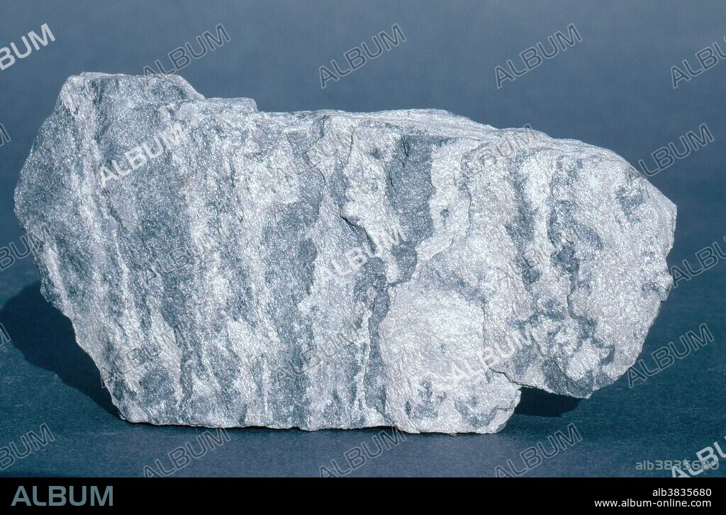 Phyllite, a metamorphic rock. Phyllite is formed by continuing metamorphic pressure on slate. Even more pressure would produce a schist. This sample of phyllite is from Tasmania.