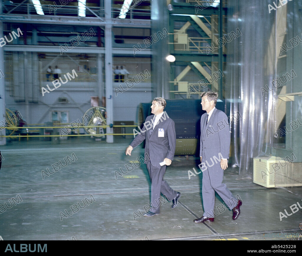 President Kennedy Tours Marshall with von Braun, September 11, 1962. President John F. Kennedy at Marshall Space Flight Center, Alabama, USA. Here President Kennedy and Dr. Wernher von Braun, MSFC Director, tour one of the laboratories.