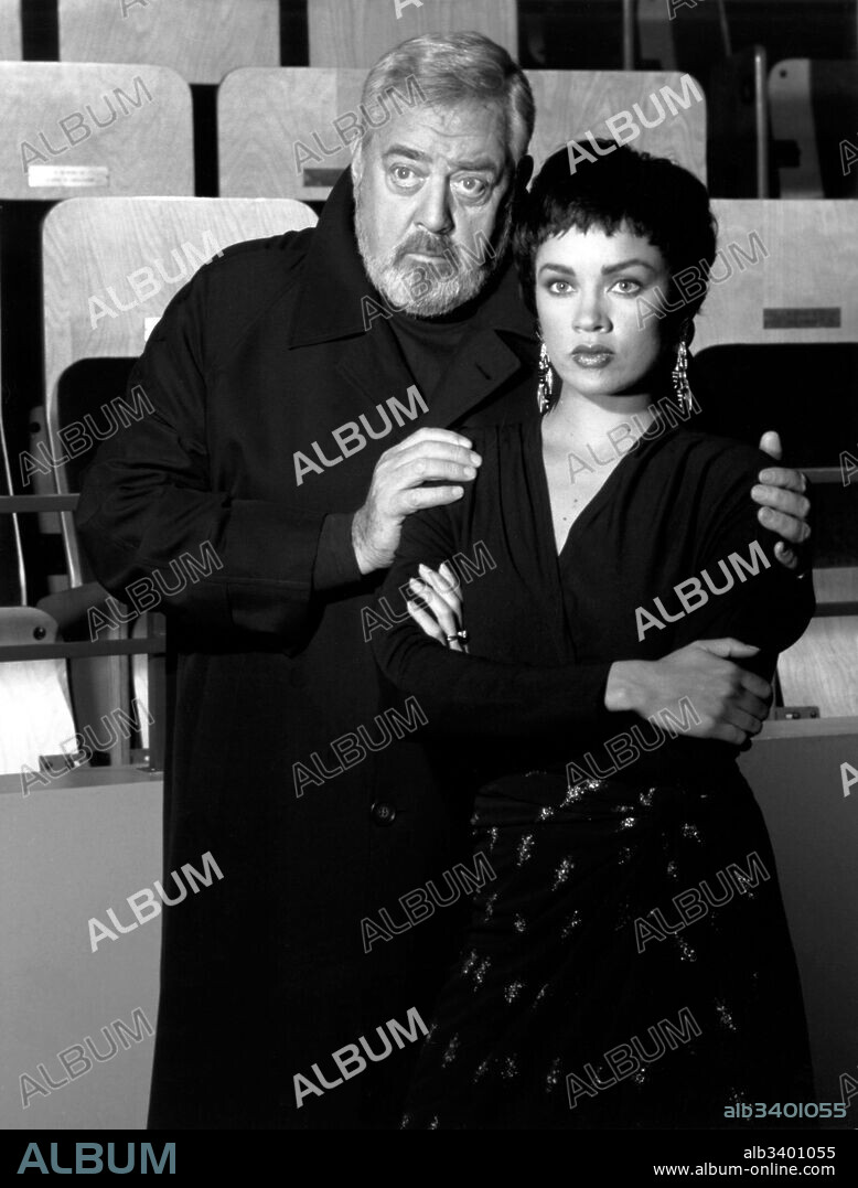RAYMOND BURR and VANESSA WILLIAMS in PERRY MASON: THE CASE OF THE SILENCED SINGER, 1990, directed by RON SATLOF. Copyright VIACOM PRODUCTIONS.