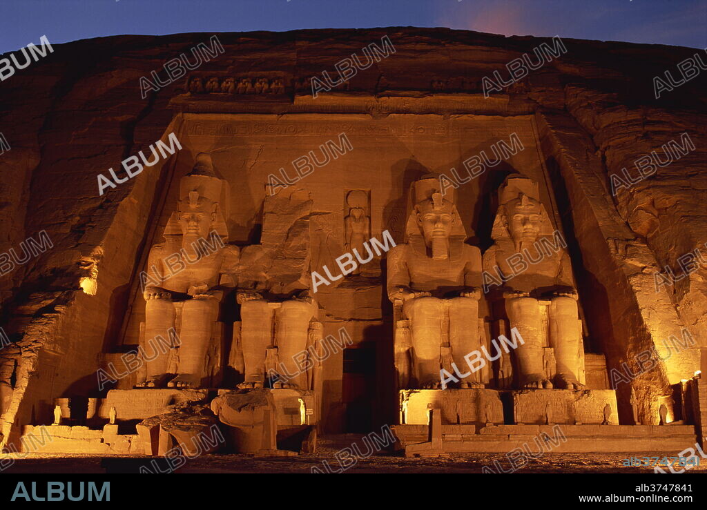 Colossi of Ramses II, floodlit, Great Temple of Ramses II, Abu Simbel, UNESCO World Heritage Site, Egypt, North Africa, Africa.