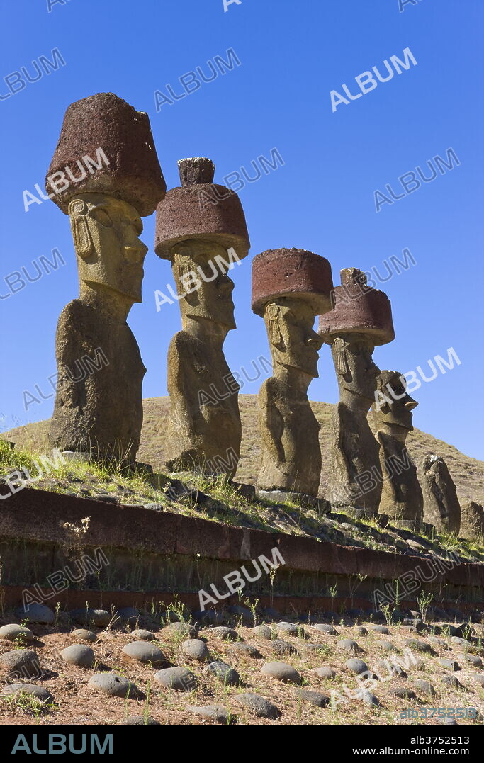 Anakena beach, monolithic giant stone Moai statues of Ahu Nau Nau, four of which have topknots, Rapa Nui (Easter Island), UNESCO World Heritage Site, Chile, South America.