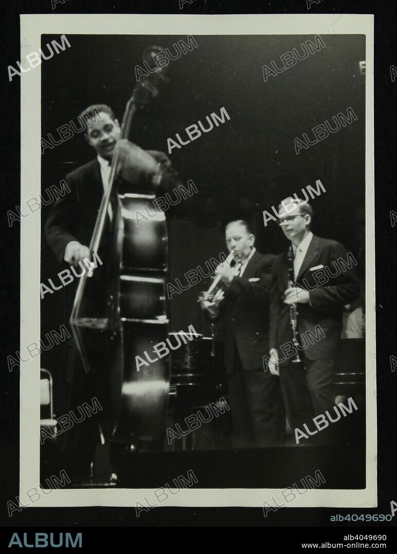 The Eddie Condon All Stars in concert, Colston Hall, Bristol, 1957. Leonard Gaskin (double bass), Wild Bill Davison (cornet) and Bob Wilber (clarinet).