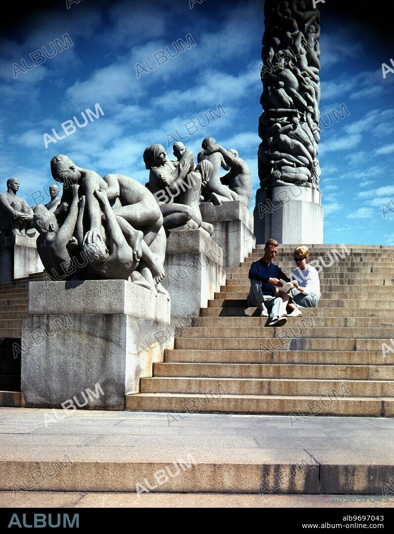 Monolith statue , Vigeland Sculpture Park , part of Frogner Park , Oslo , Norway . Granite sculptures created by Gustav Vigeland , and unveiled Christmas of 1944 after 3 stone carvers took 14 years to sculpture .