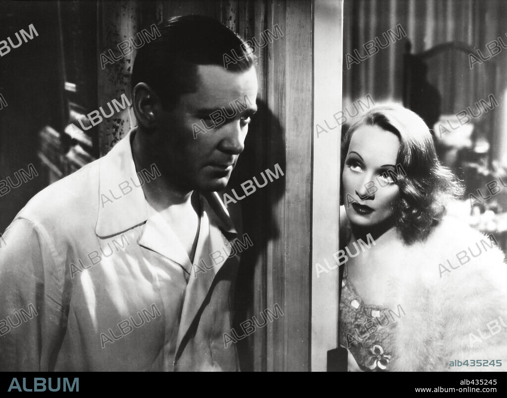 HERBERT MARSHALL and MARLENE DIETRICH in ANGEL, 1937, directed by ERNST LUBITSCH. Copyright PARAMOUNT PICTURES.