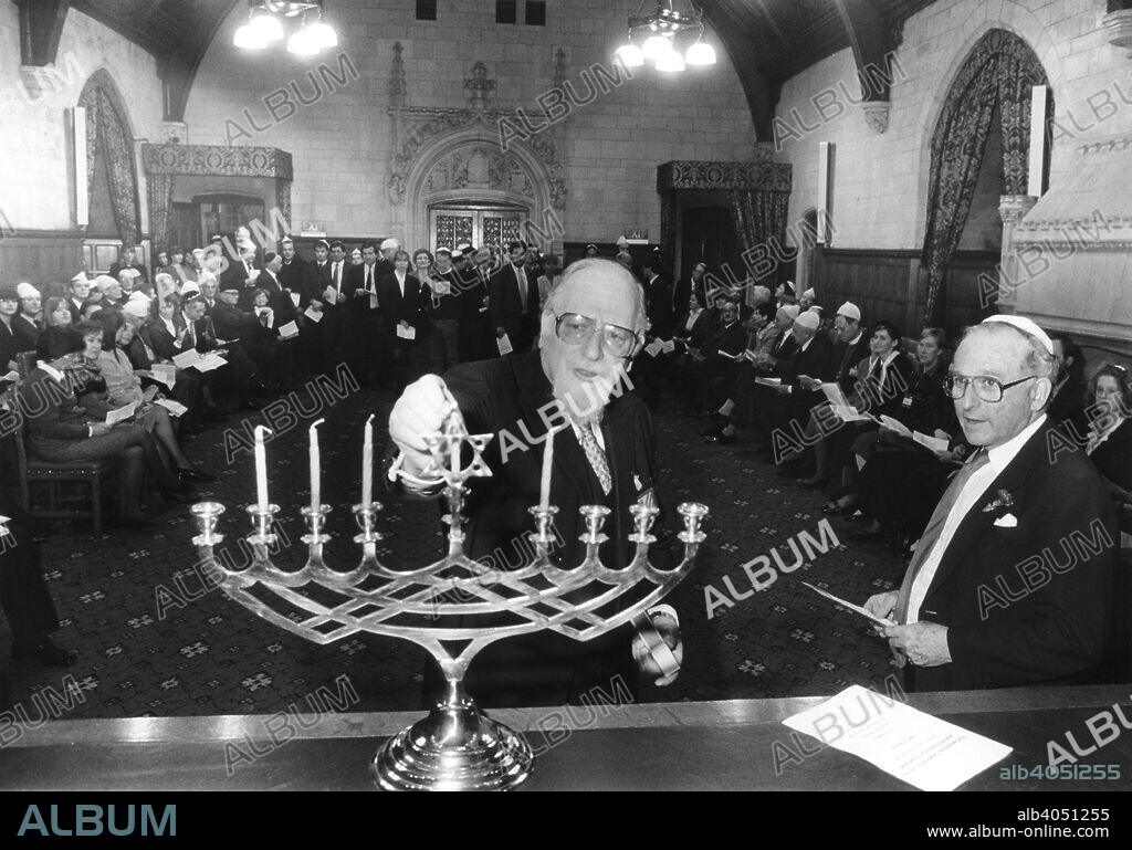 Lighting the Menorah, House of Commons, London, 1991. The menorah candlestick is a symbol of the Jewish festival of Hanukkah, or Festival of Lights, when candles are lit near the time of the winter solstice.