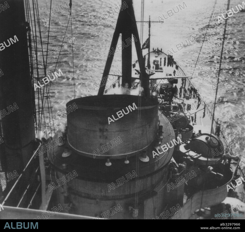 Battleships – A view from the foretop aft looking over the chimney and a searchlight towards the battle flag at the rear.