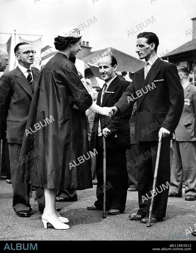The Queen, in navy blue with a white hat, shaking hands with disabled ex-servicemen residents of the Scottish Veterans Garden City, Penilee, Glasgow, yesterday, during Her Majesty's third day of State visit to Scotland. - 26th June 1953.
