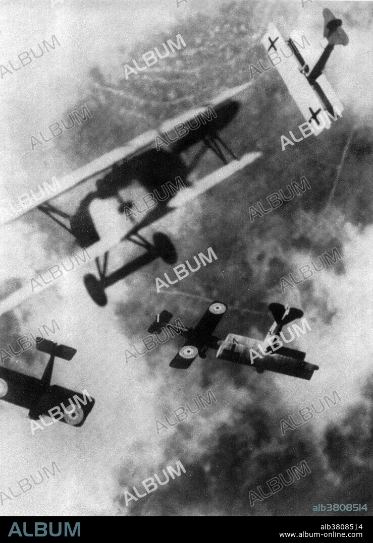 Dogfighting first emerged in World War I. Ever since heavier-than-air flight became a reality in 1903, people had been trying to figure out how to use this new technology for warfare. Once machine guns were mounted to the airplane, either on a flexible mounting or higher on the wings of early biplanes, the era of air combat began. Pilots achieved firing position while avoiding the threat of enemy guns by maneuvering behind the enemy aircraft. This is known as getting on an aircraft's six o'clock or tail, plus a wide variety of other terms, usually coined by air crews. This type of combat became known as dogfighting. Oswald Boelcke, a German fighter ace during World War I, was the first to publish the basic rules for aerial combat maneuvring in 1916, known as the Dicta Boelcke. He advised pilots to attack from the direction of the sun (toward which the defending pilot could not see), or to fly at a higher altitude than the opponent. Most of these rules are still as valuable nowadays as they were a century ago. Caption: Composite picture of a dogfight between fighter planes (film of this period was not fast enough to capture action like this).