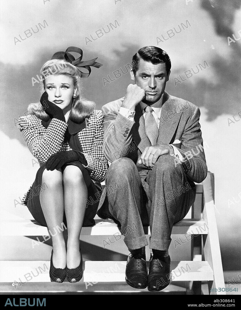 CARY GRANT and GINGER ROGERS in ONCE UPON A HONEYMOON, 1942, directed by LEO MCCAREY. Copyright RKO.