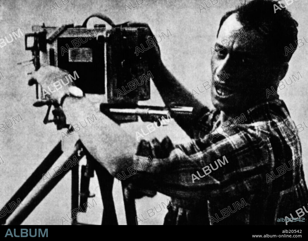 MIKHAIL HAUFMAN in THE MAN WITH A MOVIE CAMERA, 1929 (CHELOVEK S KINOAPPARATOM), directed by DZIGA VERTOV.