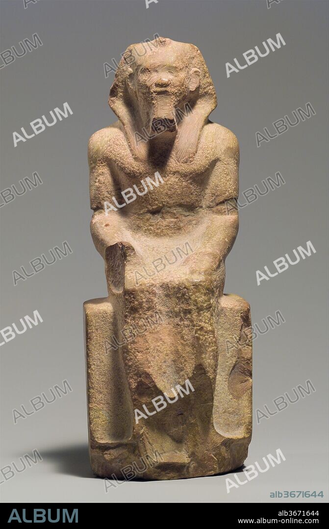 Seated Statue of King Menkaure. Dimensions: H. 20 cm (7 7/8 in.). Dynasty: Dynasty 4. Reign: reign of Menkaure. Date: ca. 2490-2472 B.C..
Menkaure, son of Khafre and grandson of Khufu, built the Third Pyramid at Giza. Unlike the First and Second Pyramids of his father and grandfather which were covered in white limestone, Menkaure planned to case his pyramid in granite. This remained unfinished at his death and was never completed. His pyramid complex was excavated by a joint expedition of Harvard University and the Museum of Fine Arts, Boston, in 1908.
This unfinished statuette of Menkaure was found in a sculptor's workshop associated with the valley temple of his pyramid. It was one of fourteen statuettes of the king found there, all unfinished and in various stages of the sculptural process. It depicts the king in the traditional pose, seated with his left hand flat, palm down on this thigh; his right hand, here broken off, would have been in a fist. The feet of the statuette and the front part of the base on which they rested were destroyed as well. The king is seated on a blocklike throne that, when complete, would have been carved with the sematawy symbol, which represents the unity of Upper and Lower Egypt. He wears the nemes headcloth and false beard, and traces of the uraeus can be seen on the brow.
The statuette is made of a good quality hard limestone and still shows traces of the preliminary blocking-out of the figure, which have been partly obscured by the initial polishing of the surface. The musculature of the torso has been indicated and the statuette shows the outlines of the square mature face of Menkaure displayed in the large statues of greywacke and alabaster found elsewhere in his valley temple.