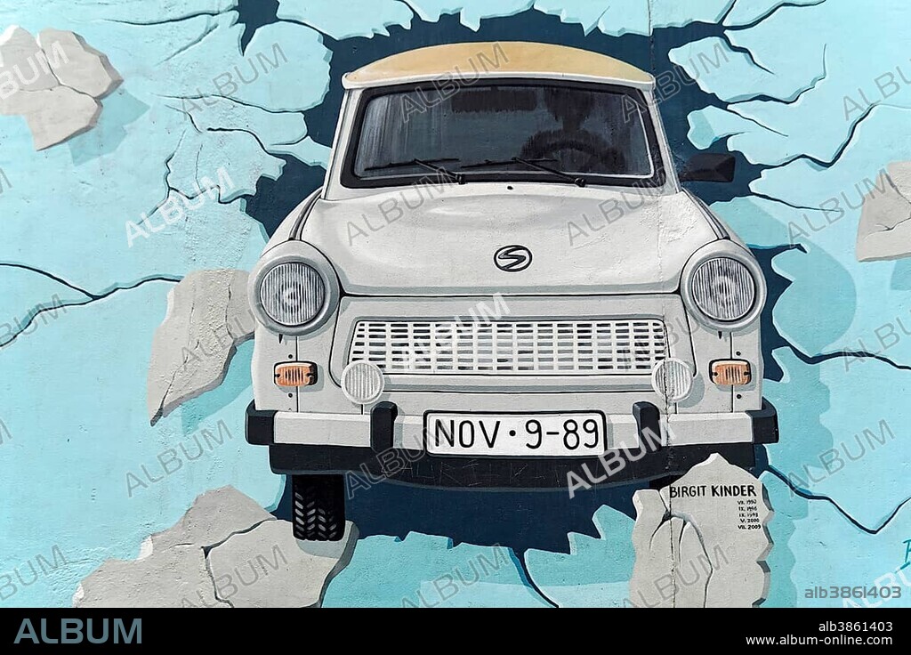 Mural, Test the Best, Trabi breaking through wall, artist Birgit Kinder, East Side Gallery, Berlin, Germany, Europe.