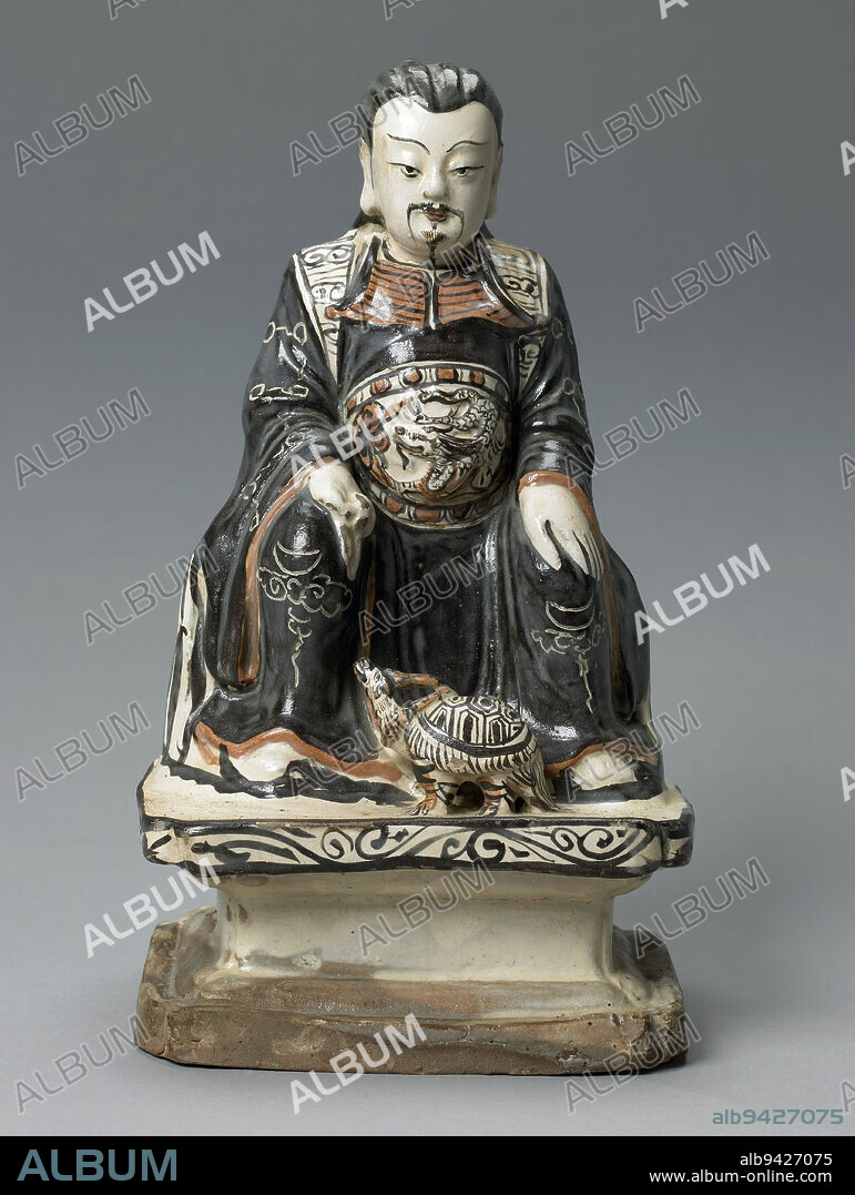 Chen-Wu, The Taoist Deity of the North, 14th-15th century, 11 1/2 x 5 1/4 x 6 1/2 in. (29.21 x 13.34 x 16.51 cm), Tz'u-chou ware Slip-coated stoneware with dark brown and russet brown painted décor under a clear glaze., China, 14th-15th century, The origins of the deity Zhenwu (perfected warrior) go back to the Warring States (3rd century b.c.) and Han dynasty (206 b.c.-220 a.d.) periods. At that time, he was known as Xuanwu (the dark warrior), and was simply represented by a tortoise entwined by a snake. Xuanwu was the ancient symbol of the north and often appeared with three other animals: the dragon, red bird, and tiger, to symbolize the four directions. The transformation of Xuanwu from a snake-entwined tortoise to the Daoist deity Zhenwu, represented as a robust human-form warrior, occurred around 1000 a.d. The period of Zhenwu's greatest popularity was the Ming dynasty (1368-1644).