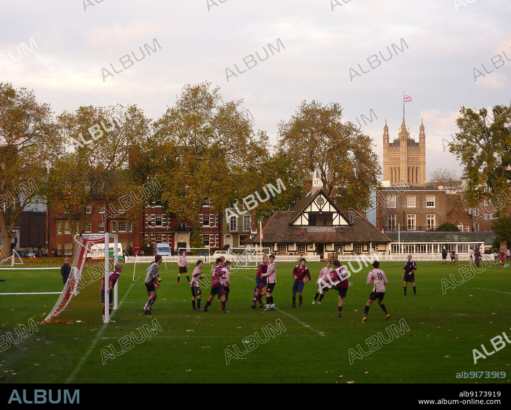 SIMON INGLIS. Westminster School Playing Field, Pavilion, Vincent Square, Victoria, City of Westminster, Greater London Authority, 2010. A football match in play at the Westminster School Playing Field, Westminster, with the pavilion beyond. The playing field in Vincent Square was laid out by Westminster School in 1810 and is London's second oldest enclosed sports ground. The pavilion was opened in 1889 and was refurbished in 2010.