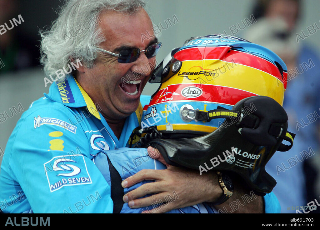 May 29, 2005; Nurburgring, GERMANY; Renault boss FLAVIO BRIATORE congratulates FERNANDO ALONSO on his win at the Formula One Grand Prix of Europe 2005 at the Nurburgring. Mandatory Credit: Photo by Photo4 / LaPresse / ZUMA Press. (©) Copyright 2005 by LaPresse. 29/05/2005