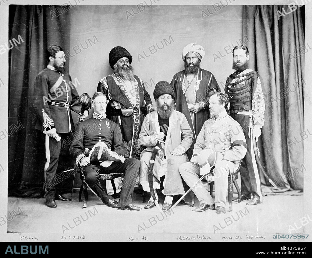 Group with Amir Sher Ali Khan and British and Afghan officials, Ambala. A group portrait, with Amir Sher Ali seated with European political officers and two unidentified Afghani sirdars. The Europeans are Surgeon Major Henry Bellew (standing on the left), Col. (later Sir) Frederick Pollock (seated to the left of Amir), Col. (later General Sir) Crawford Chamberlain (seated on the right) and Col. Upperton, 16th Bengal Cavalry, (standing on the right). Macnabb Collection (Sir Donald Campbell Macnabb): Album of miscellaneous views in India. Mar. 1869. Photograph. Source: Photo 752/12(6). Language: English.