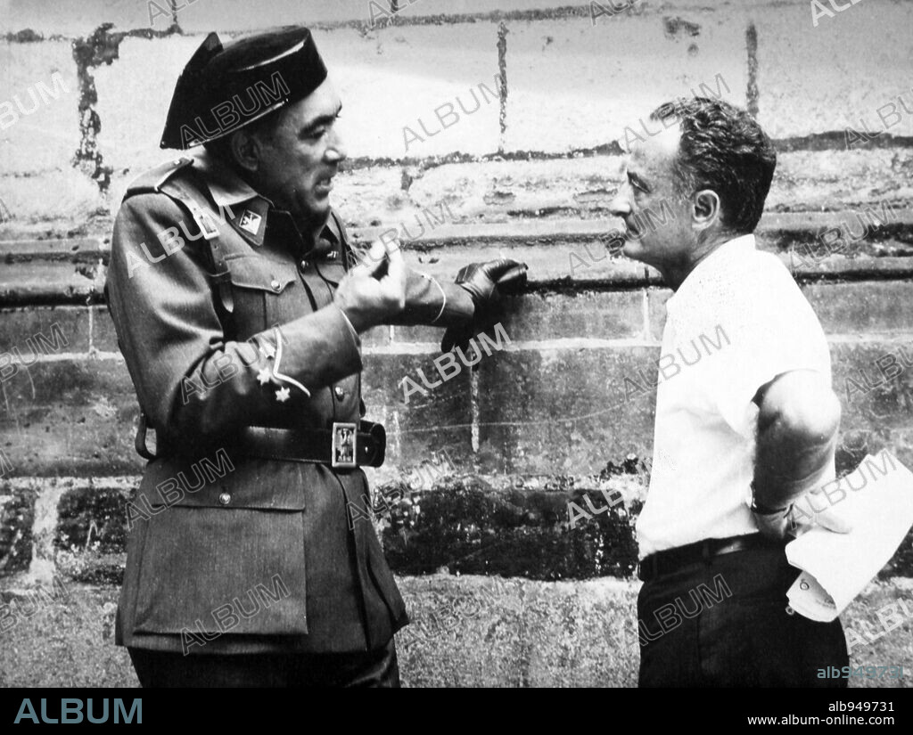 ANTHONY QUINN and FRED ZINNEMANN in BEHOLD A PALE HORSE, 1964, directed by FRED ZINNEMANN. Copyright COLUMBIA PICTURES.