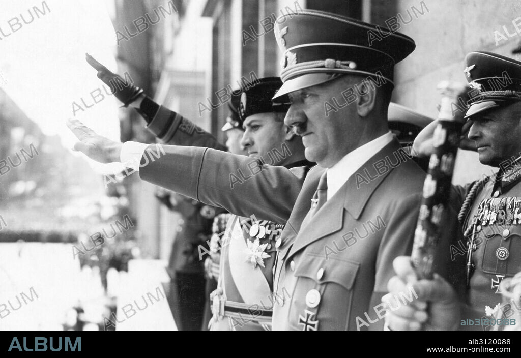 Photograph of Adolf Hitler and Count Ciano saluting on the chancellery balcony, Berlin. Dated 1943.