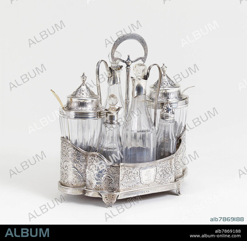 GEWÜRZMÉNAGE. <br />London. <br /><br />Silber, Glas. Menagerie best. aus 8 Gefäßen und Tragegestell. H. 26cm. <br /><br />Beschau London. Zustand C.